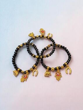 Set of 3 Black Beaded Stretch Bracelets Gold Tone Charms Evil Eye Elephant